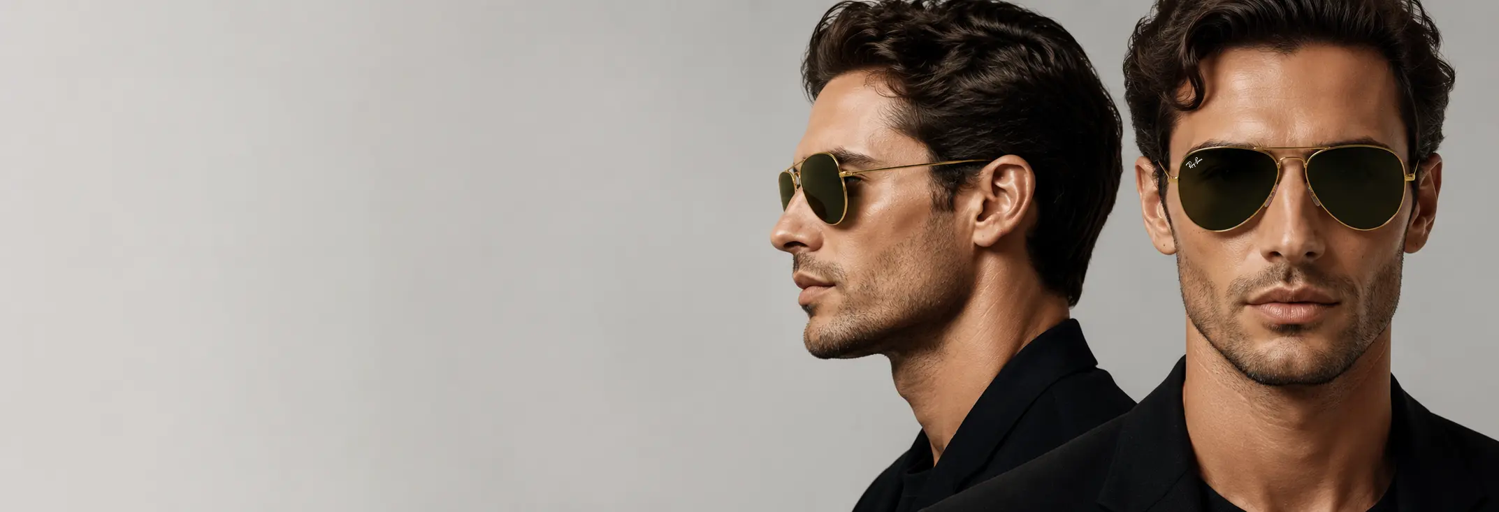 Modelo masculino usando lentes de sol Ray-Ban Aviator Large Metal con fondo gris suave