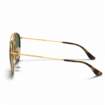 Vista lateral de Ray-Ban Round Double Bridge RB3647N 001 con varillas doradas y terminales oscuros