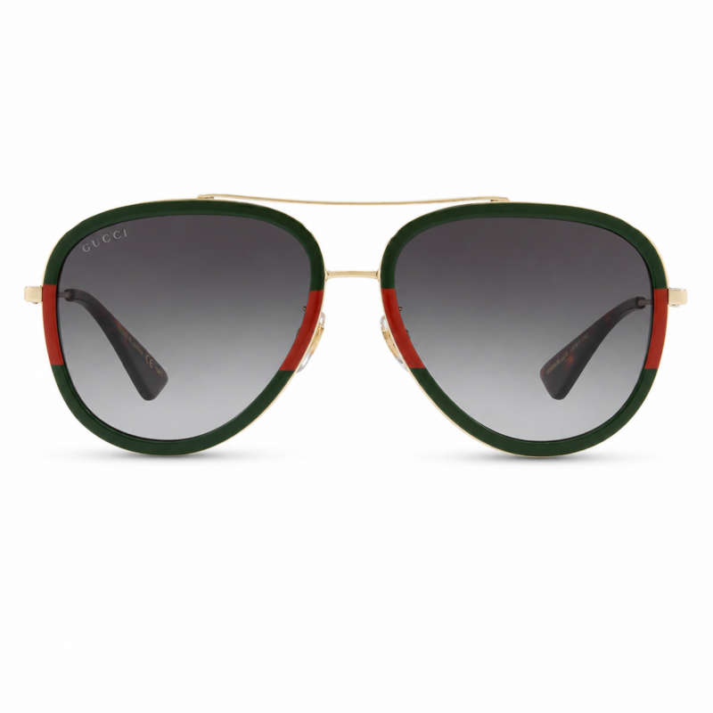 Lentes de sol Gucci estilo aviador con montura verde y rojo, estructura dorada y cristales degradados en vista frontal sobre fondo blanco.