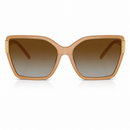 Lentes de sol Tory Burch beige en vista frontal, con montura amplia, cristales marrón degradado y detalles dorados sobre fondo blanco.